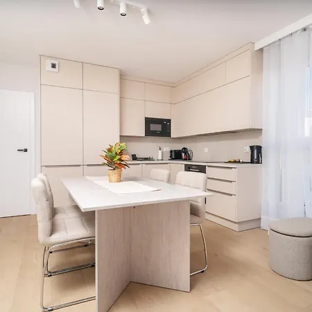 Beige Harmony For Family & Business With Parking And Ac By Uniquerent