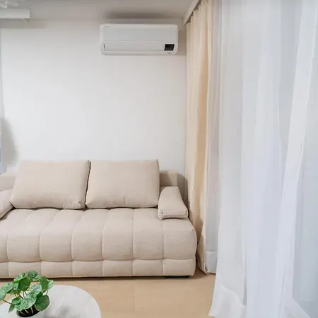 Beige Harmony For Family & Business With Parking And Ac By Uniquerent